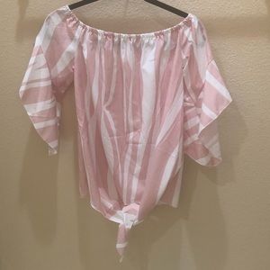 Pink and white sinched shoulders and tie at belly